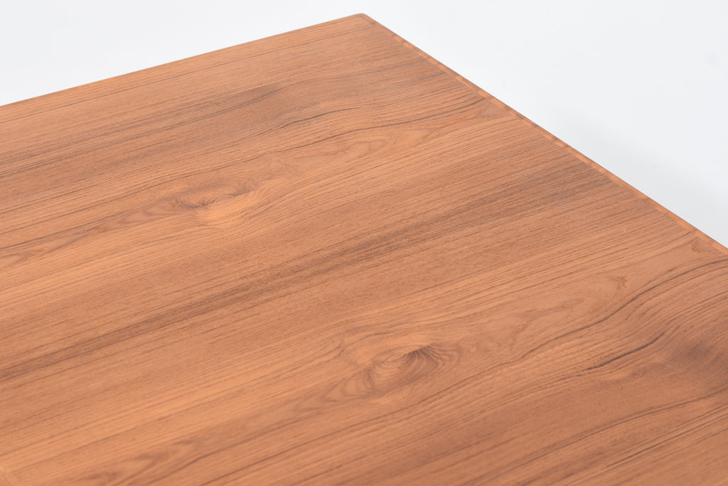 Large extending dining table in teak