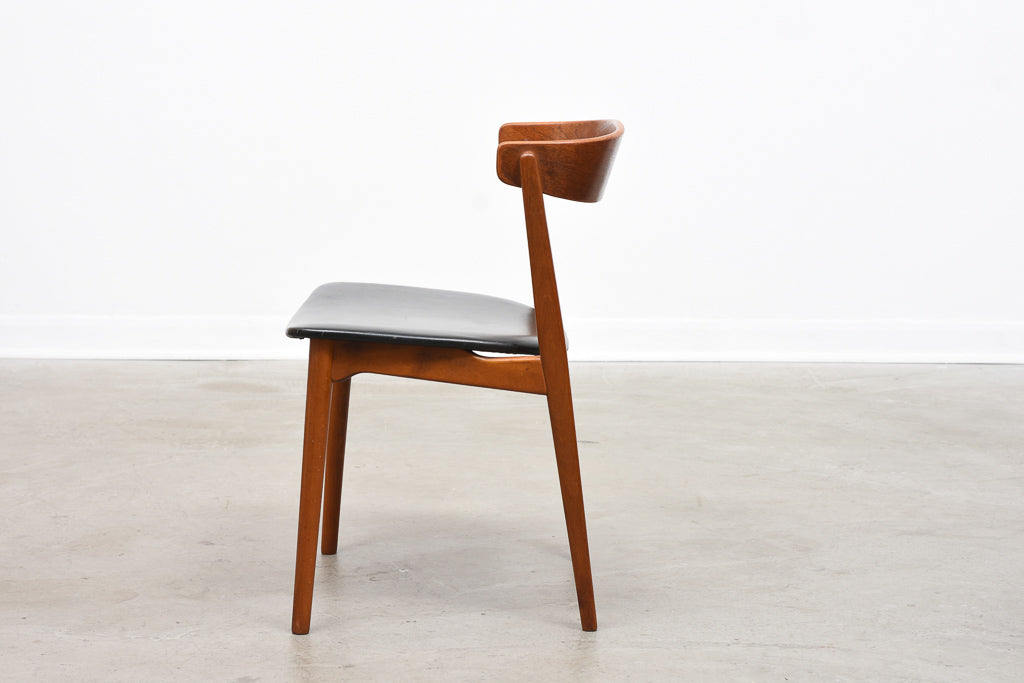 Teak chair with curved back