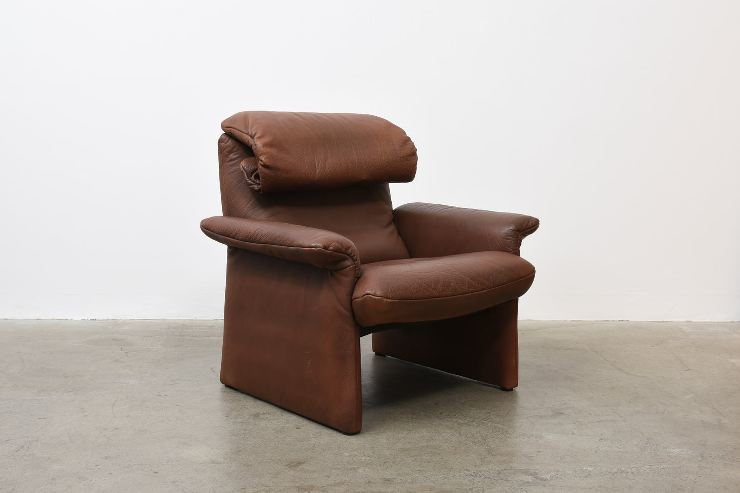 1980s reclining leather lounger + ottoman