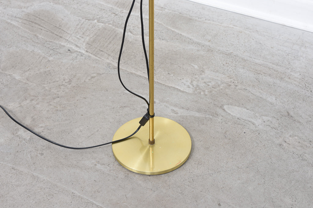 Twin-headed brass floor lamp