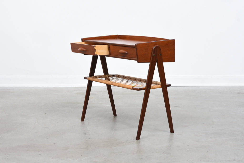 Teak side table with cane shelf