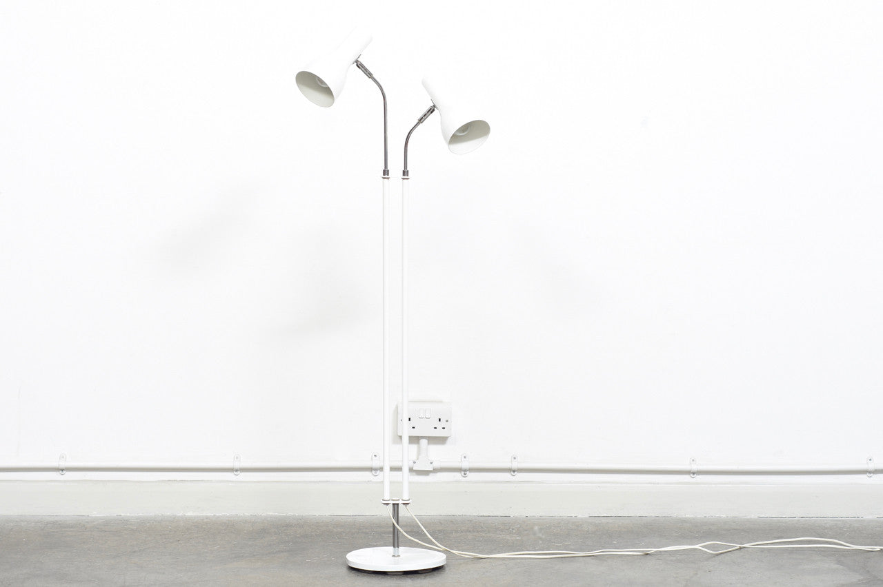 Twin-headed floor lamp with tiered white shades