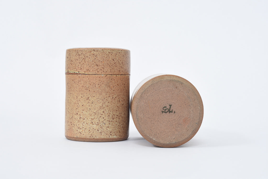 Pair of stoneware jars signed S.L.