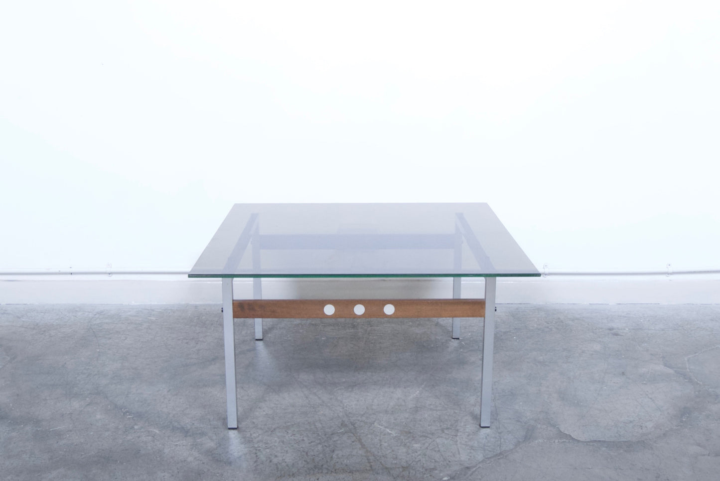 Glass and rosewood coffee table