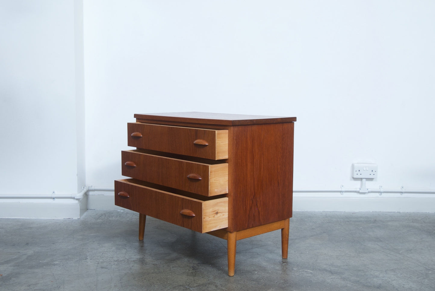 Teak chest of three drawers