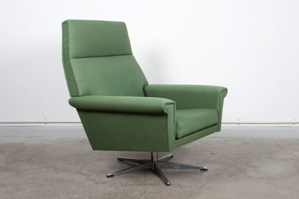 High back wool lounge chair on swivel base