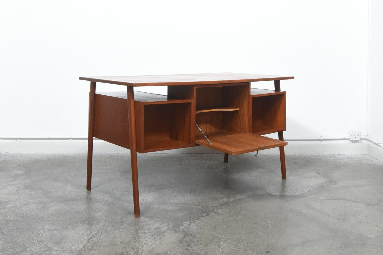 Double sided teak desk
