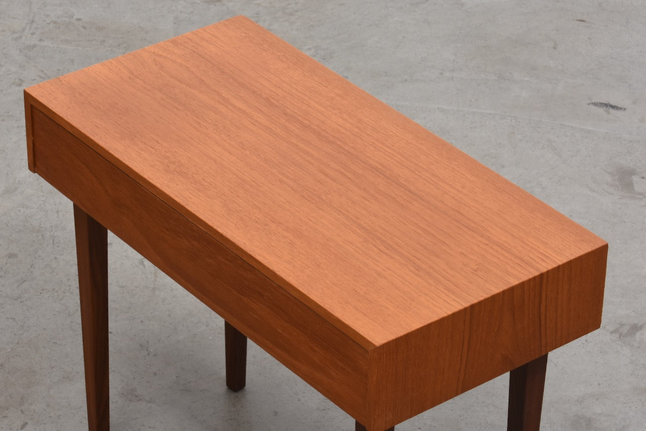 Low teak cabinet with drawer