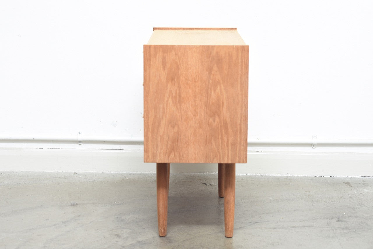 Short oak chest with lipped handles