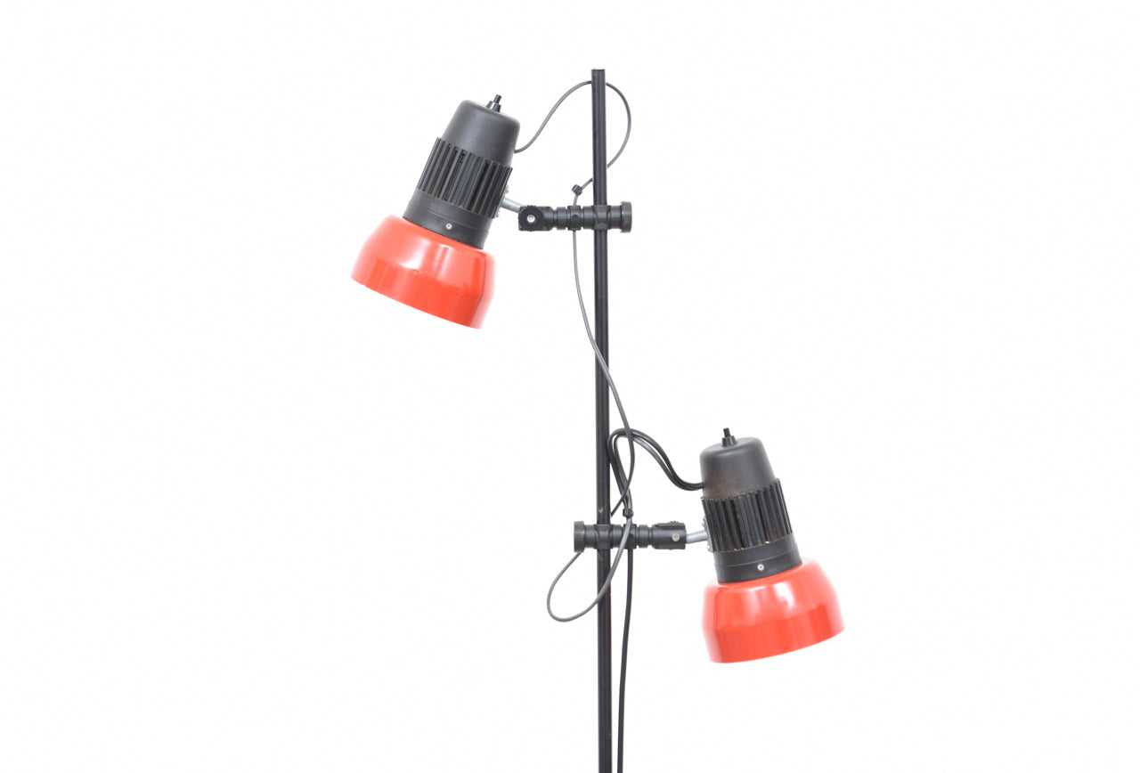 Twin-headed vintage floor lamp with red shades