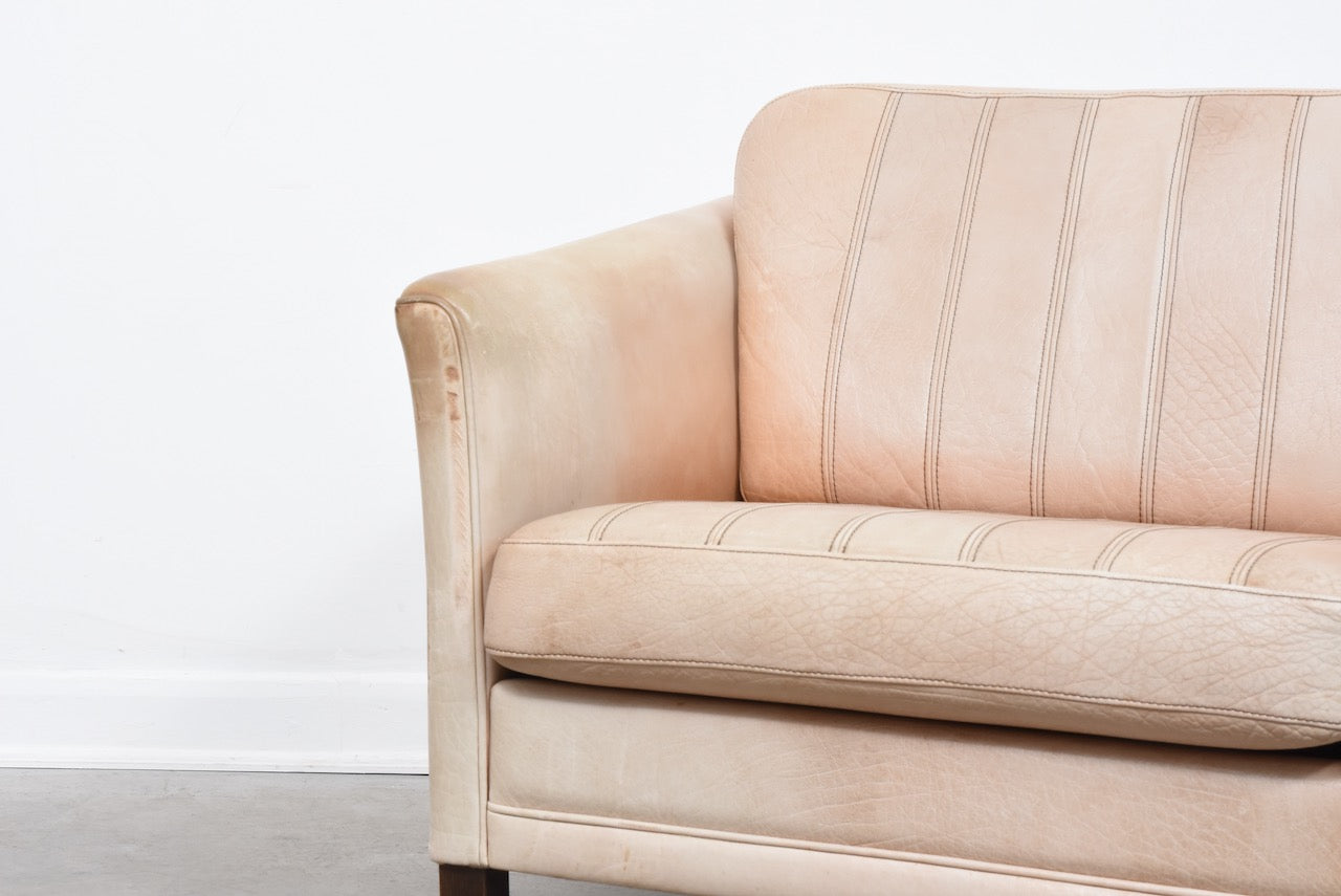 Vintage two seat tan leather sofa