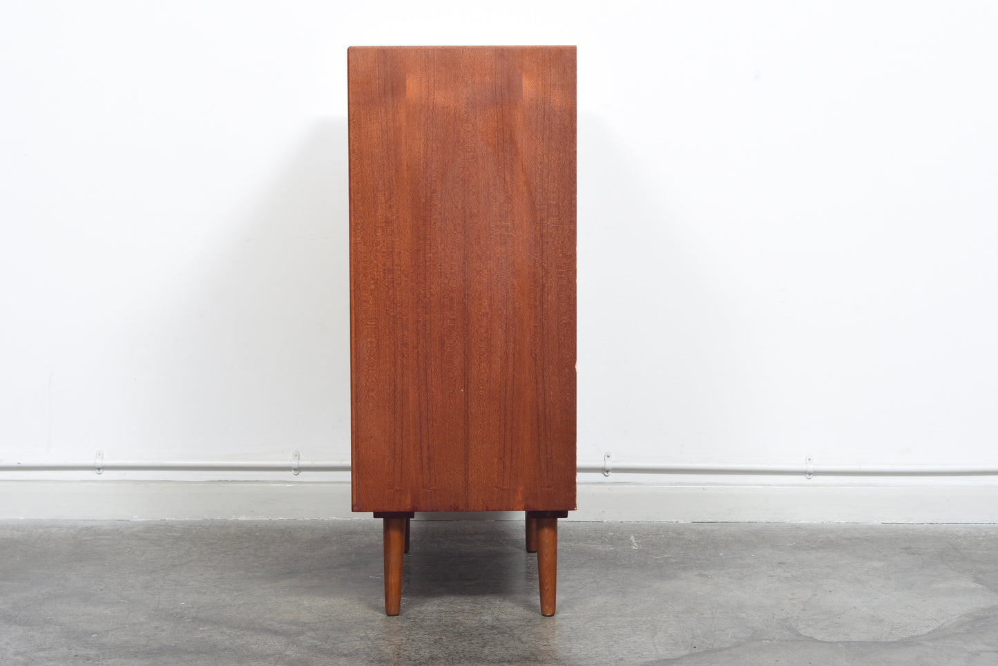 Chest of six angled drawers in teak