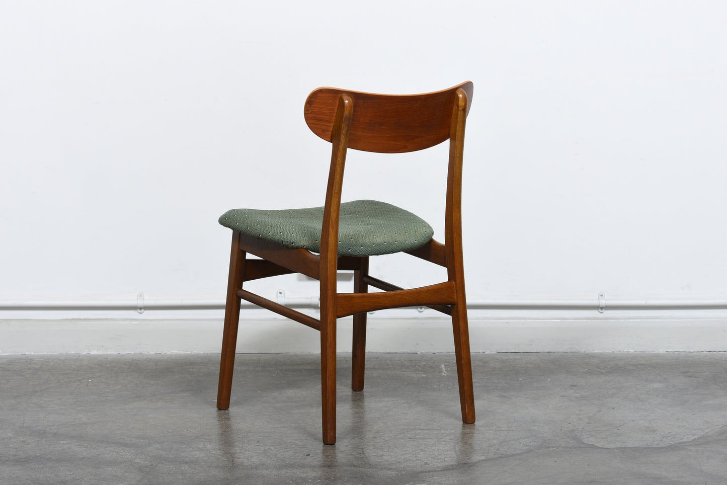 Set of four teak + beech dining chairs