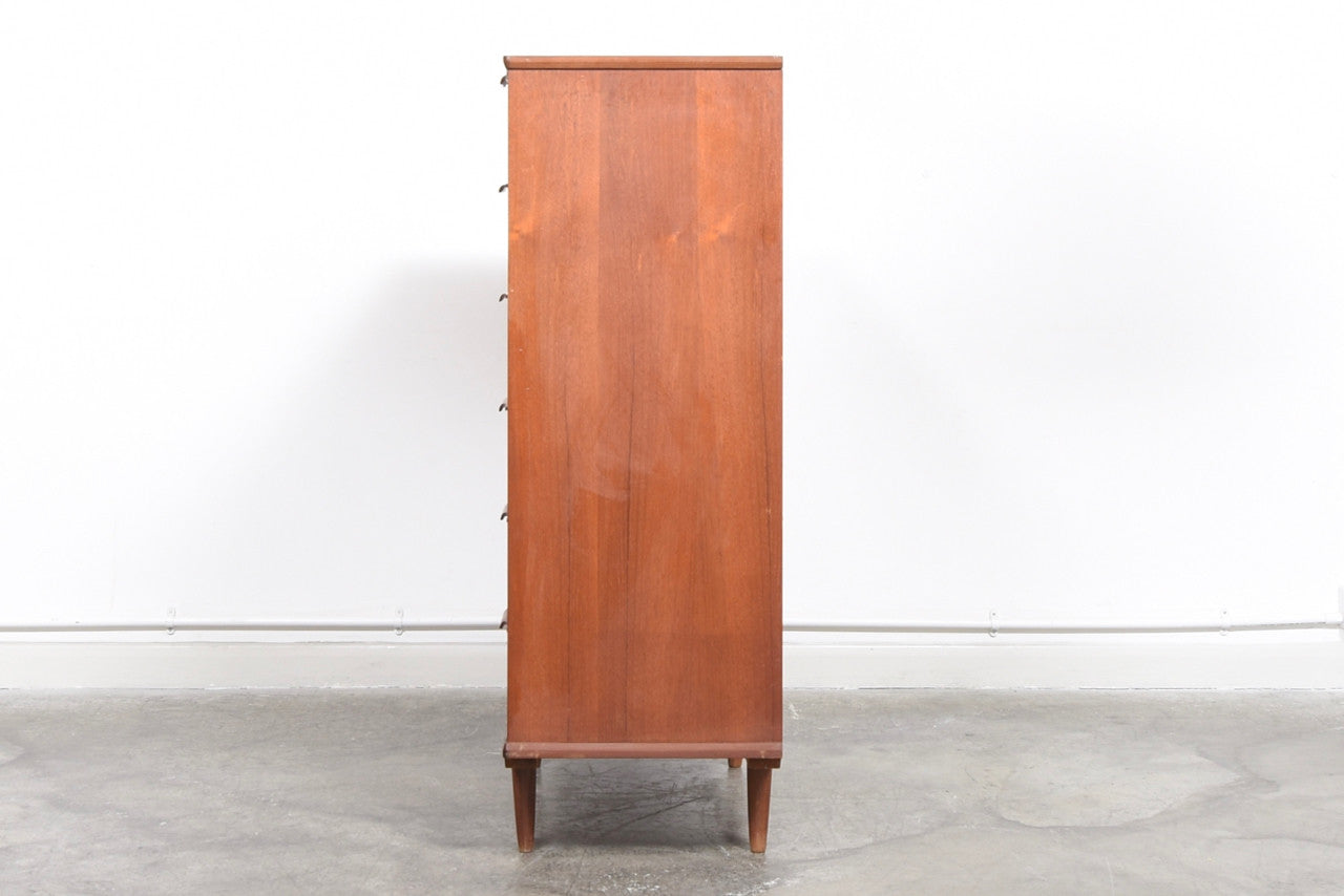 Large chest of drawers in teak with lipped handles