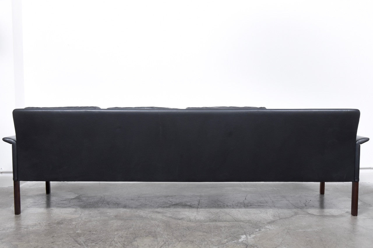 Four seat leather sofa by Hans Olsen