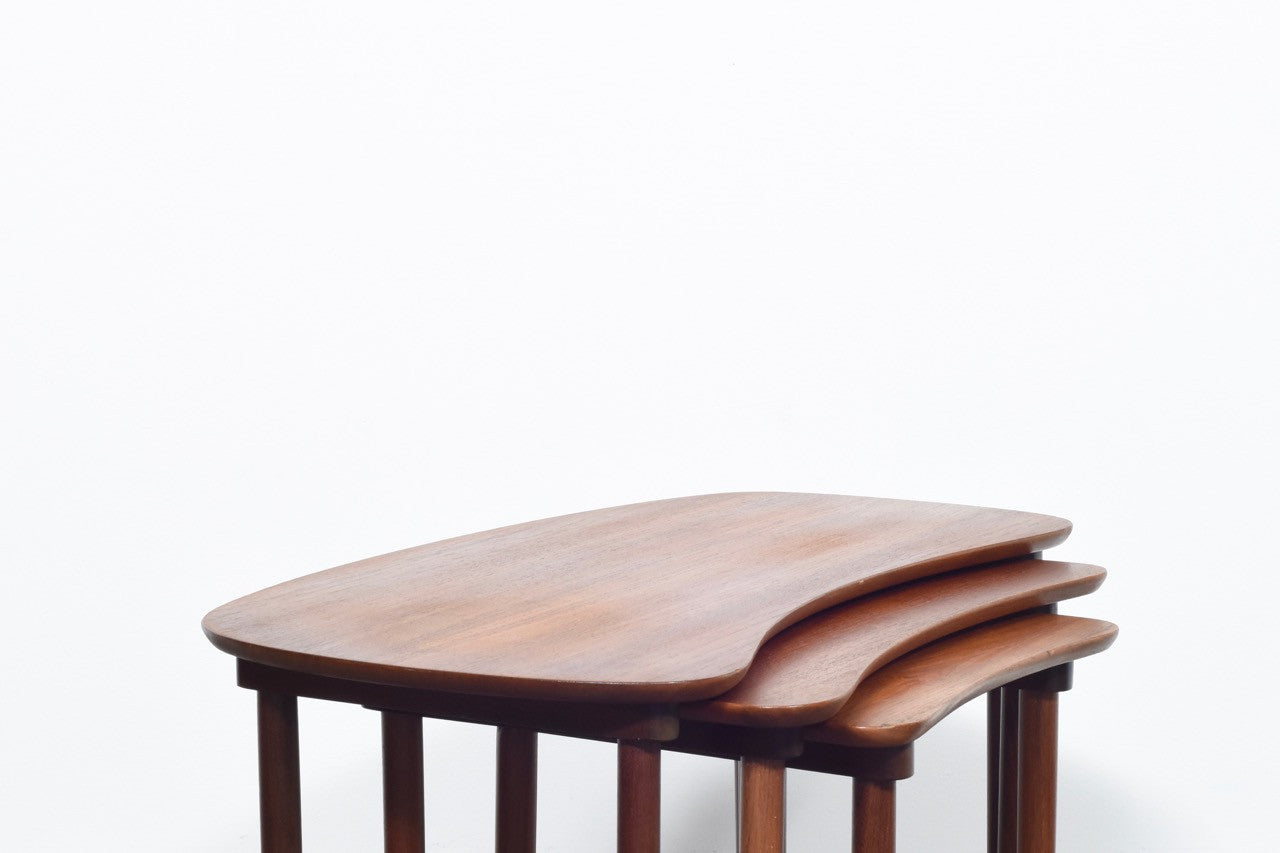 Nest of three tables in teak