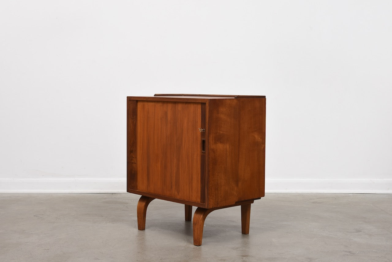 1960s teak storage cabinet on curved legs