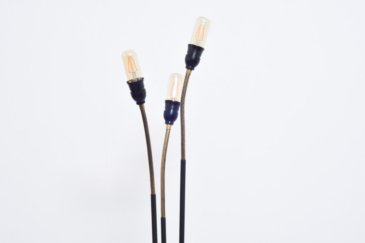 Three-headed floor lamp with adjustable heads