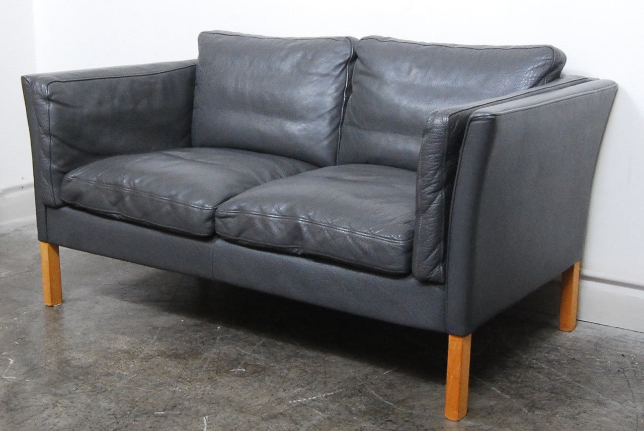 Two seat grey leather sofa