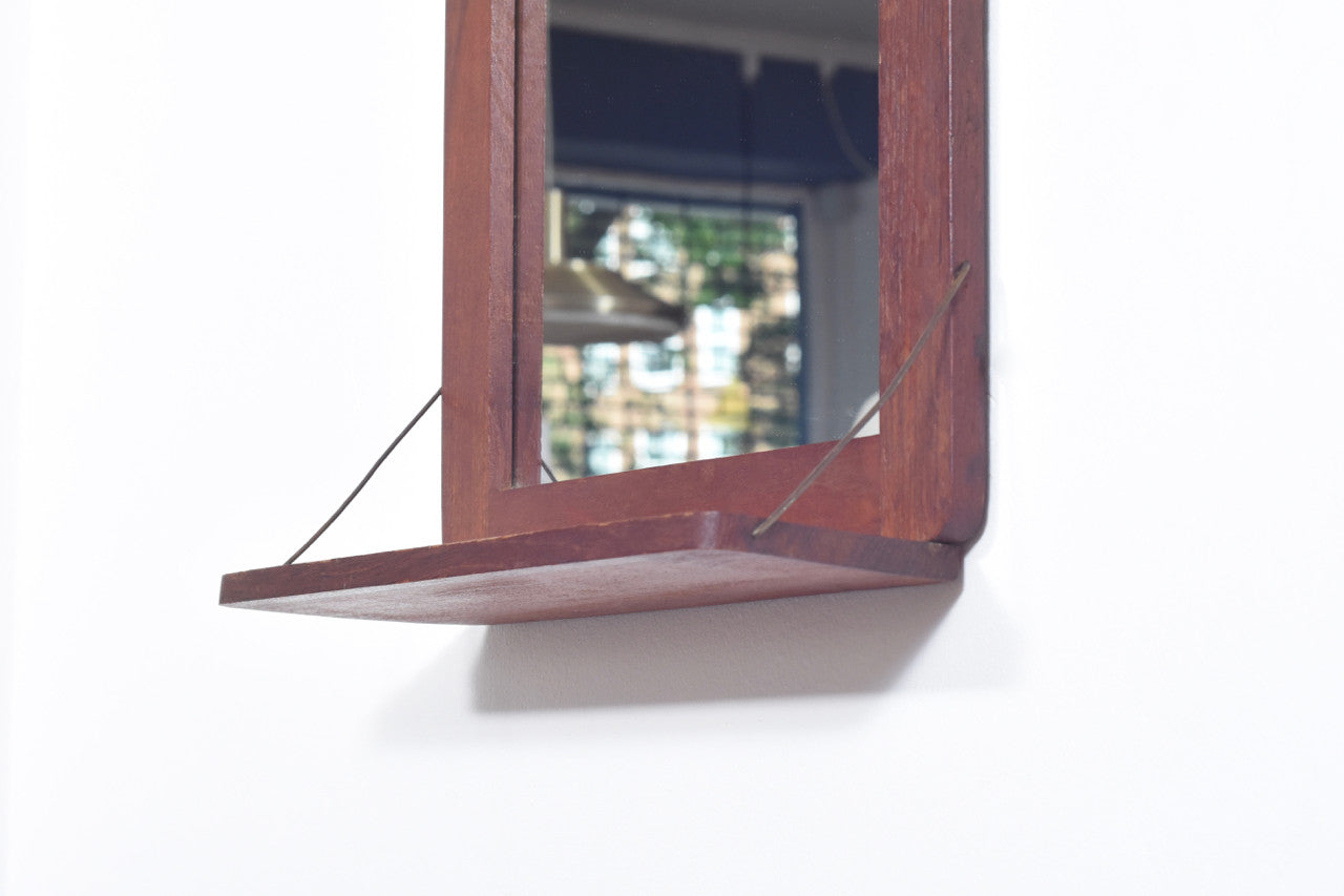 Mirror with shelf