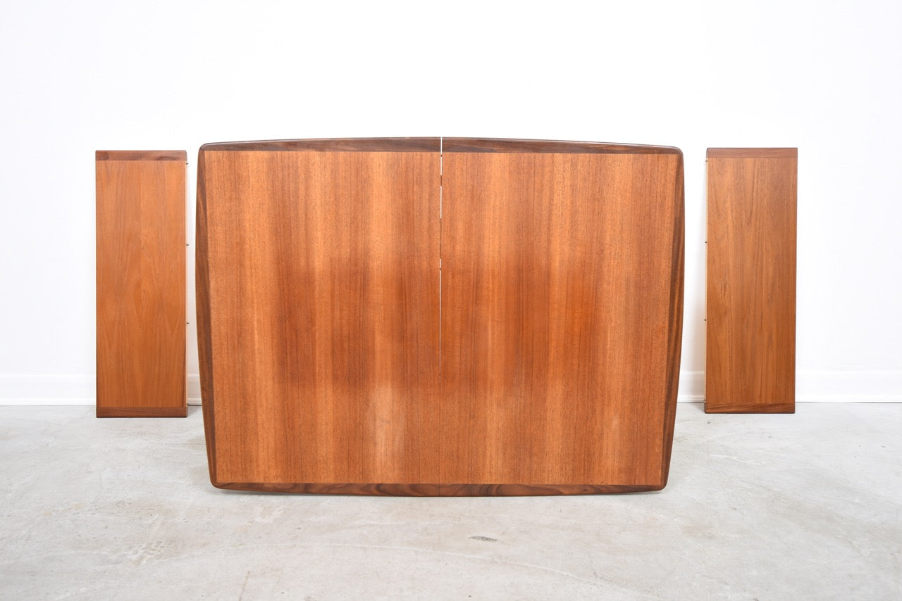 Extending teak dining table on beech legs
