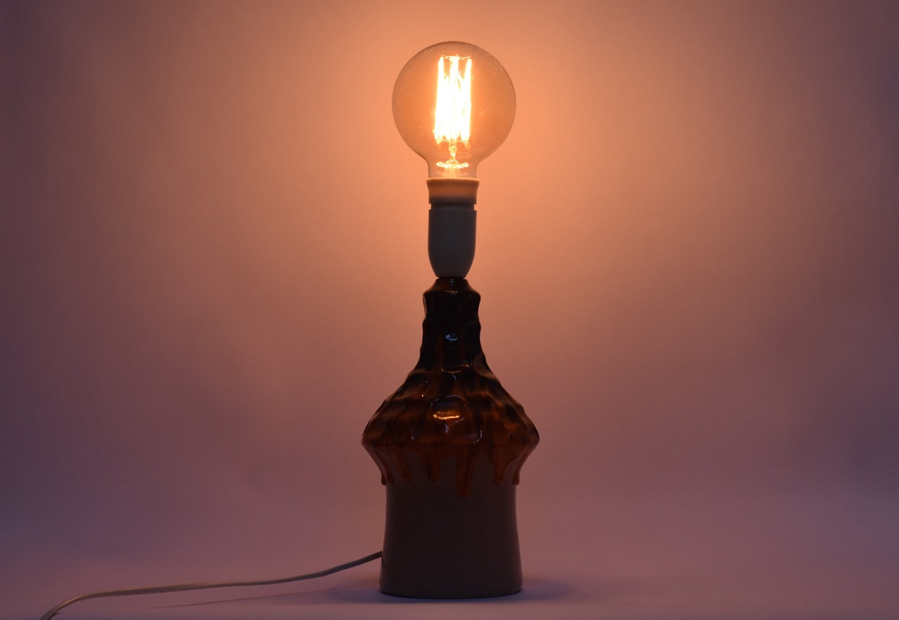 Vintage table lamp with orange + black glaze