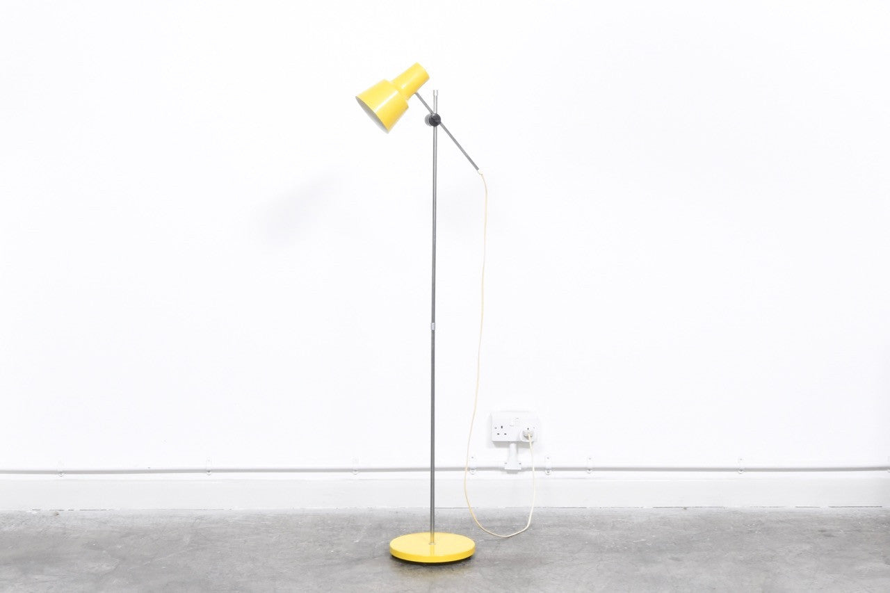 Floor lamp with yellow shade