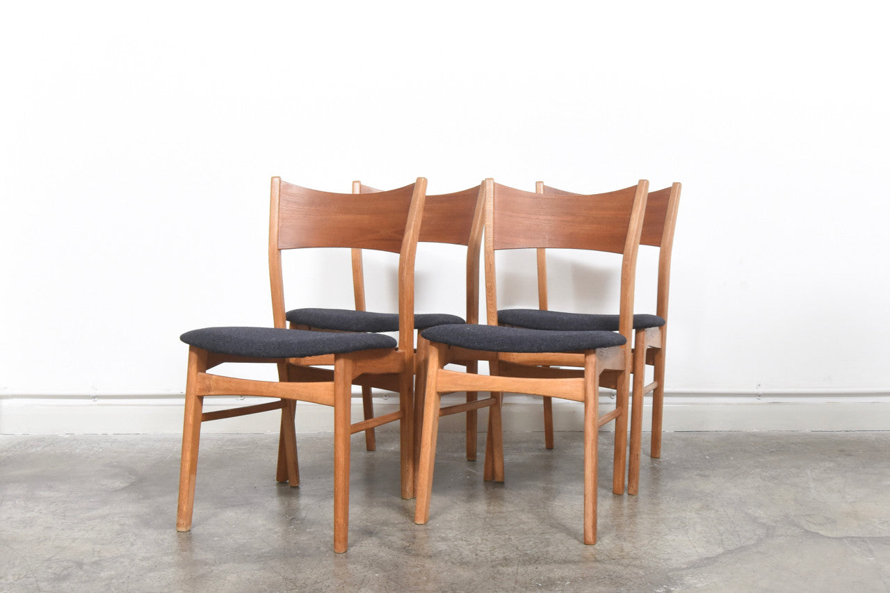 Set of four teak + oak dining chairs