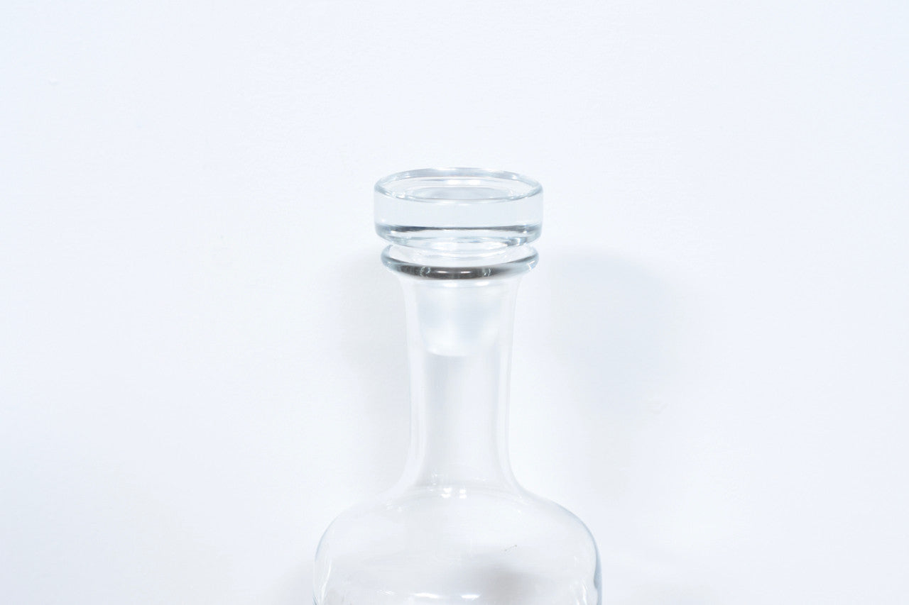 Tall glass decanter