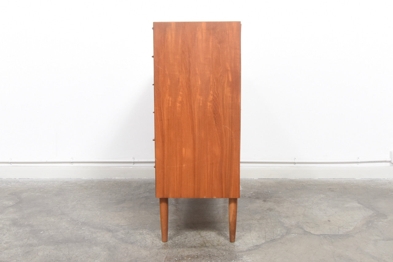 Wide chest of teak drawers