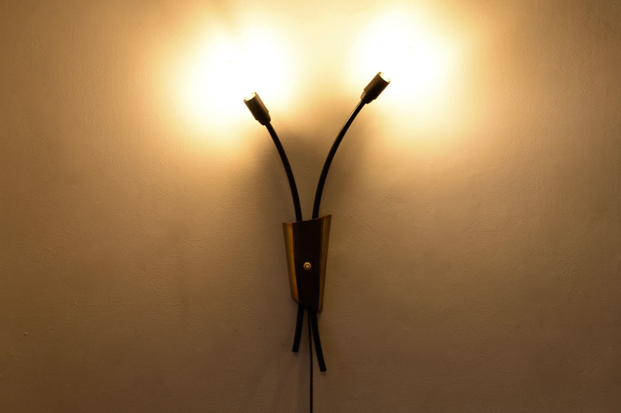 Twin-headed brass wall light