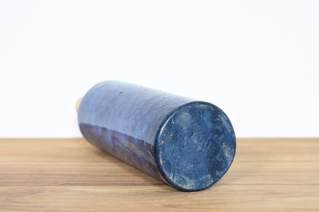 Stoneware jug with violet glaze