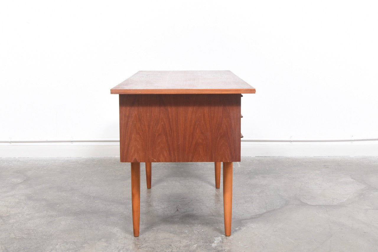 Twin pedestal desk in teak