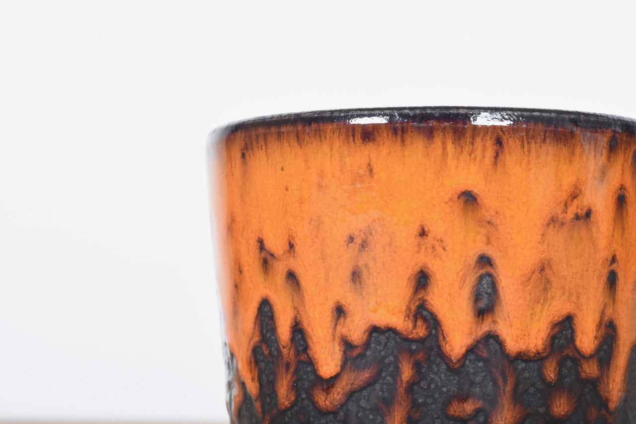 West German flower pot with orange glaze