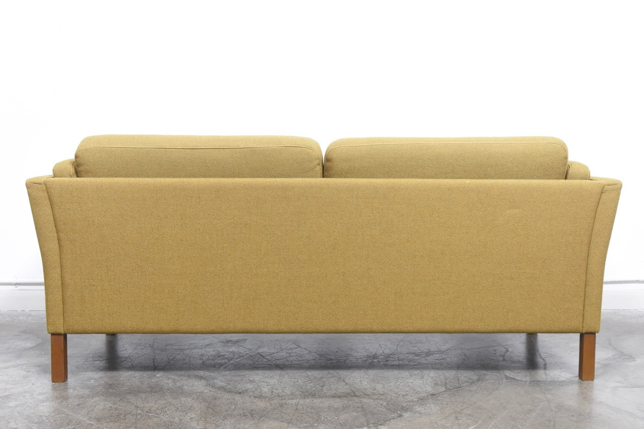 Two and a half seat sofa by Mogens Hansen