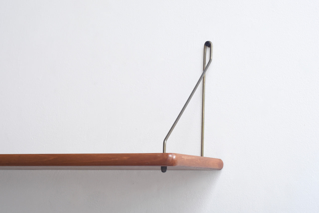 Floating shelf in teak with rounded edges