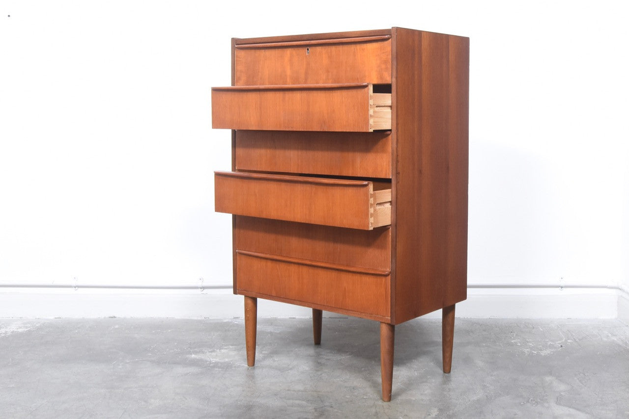 Teak chest of drawers with lipped handles