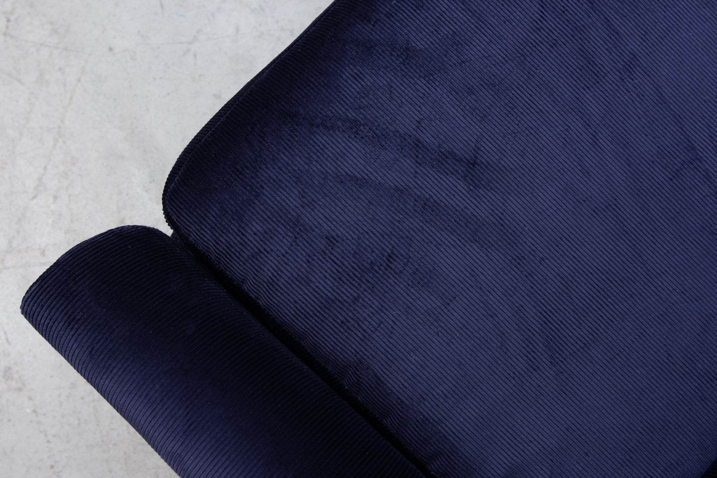 Newly upholstered: 1960s three seater in navy corduroy