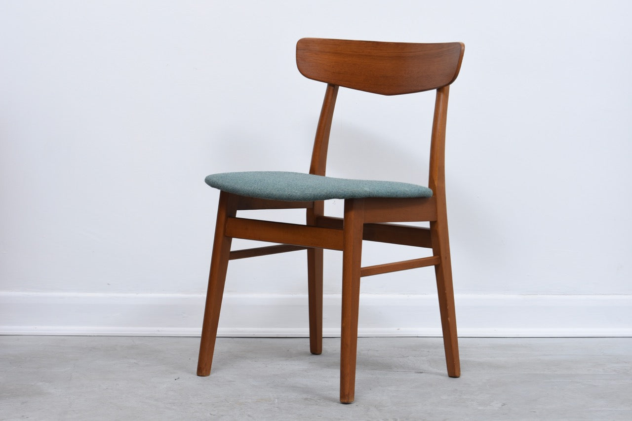 Set of four teak dining chairs