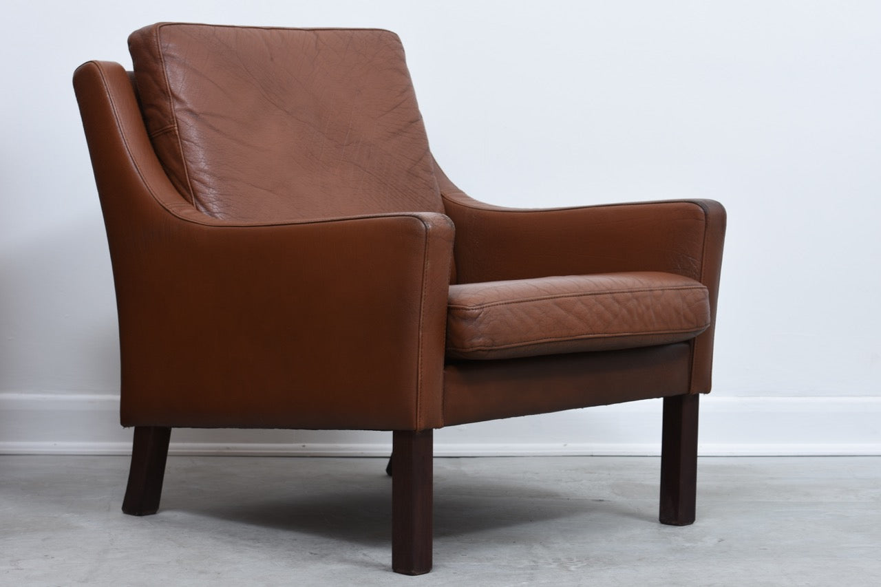Chocolate leather club chair