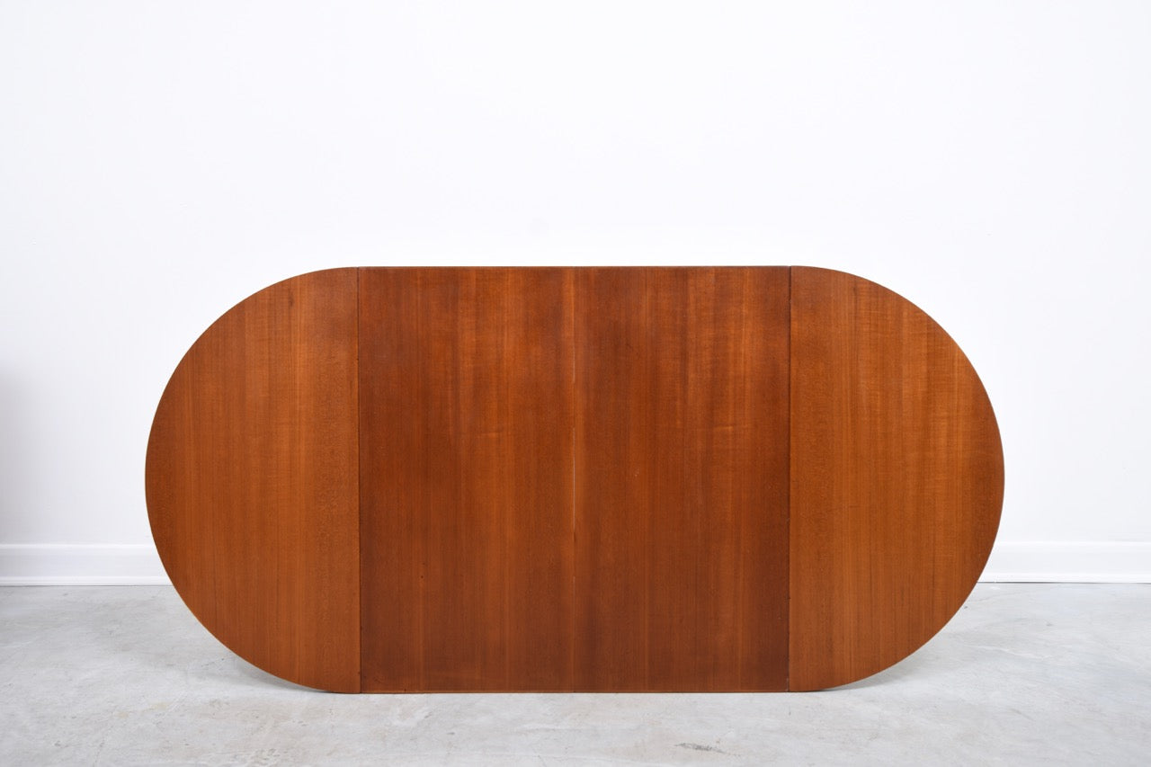 Extending square dining table