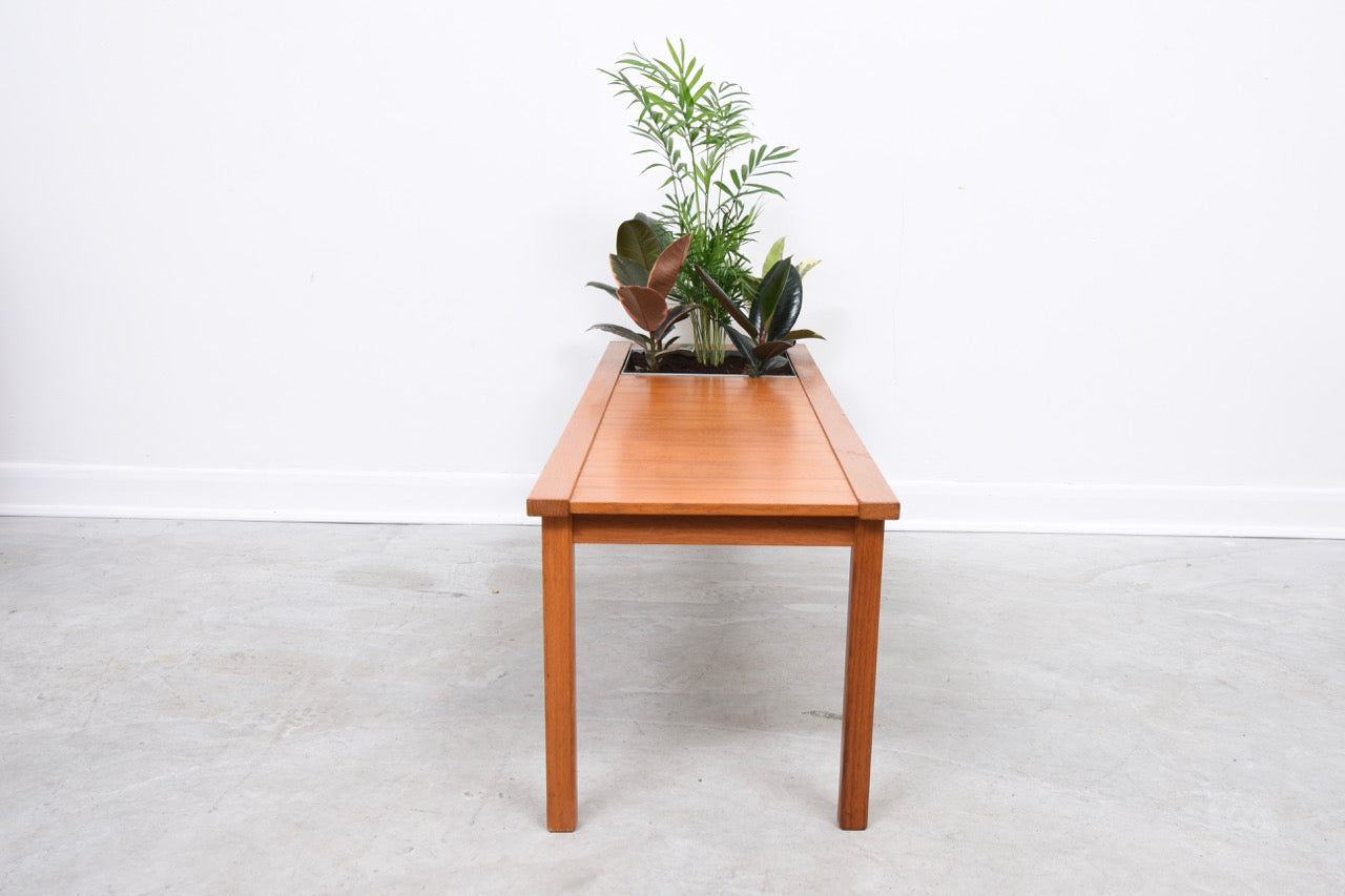 Coffee table with planter