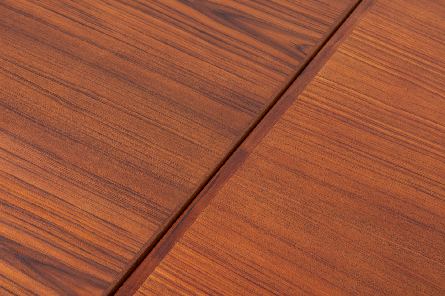 Extending teak dining table by Henning Kjærnulf