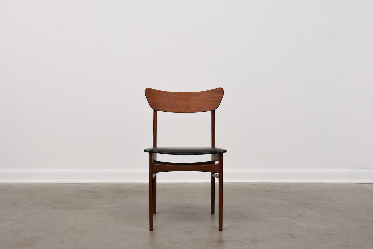 Set of four teak + vinyl dining chairs