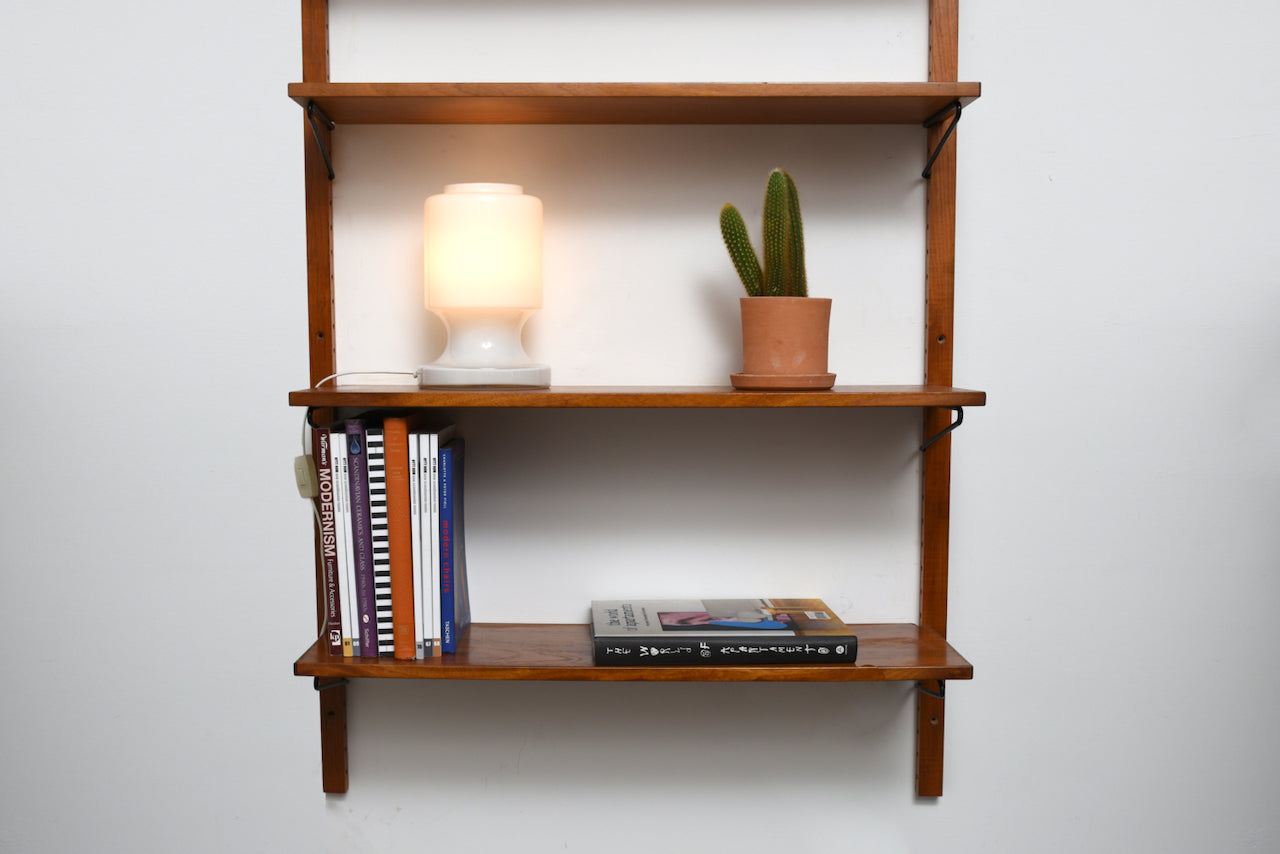 Single bay of teak shelves