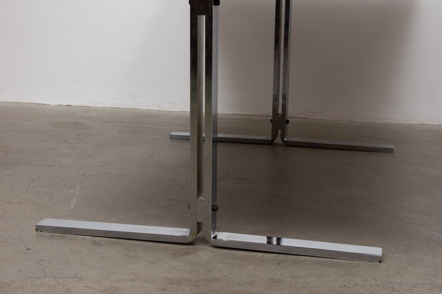 1970s rosewood + steel dining table by Poul Nørreklit