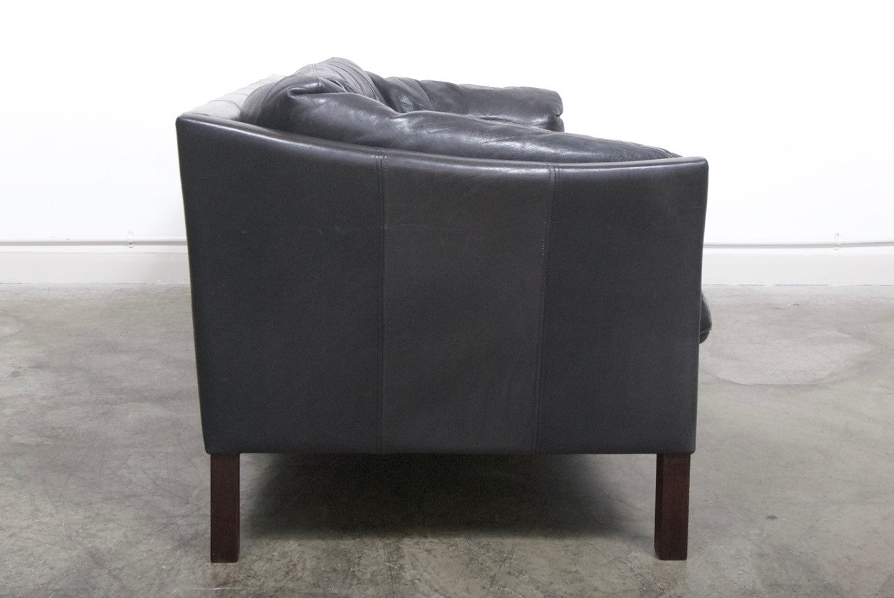 Two and a half seat leather sofa