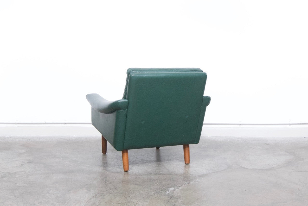 Low back green leather lounge chair