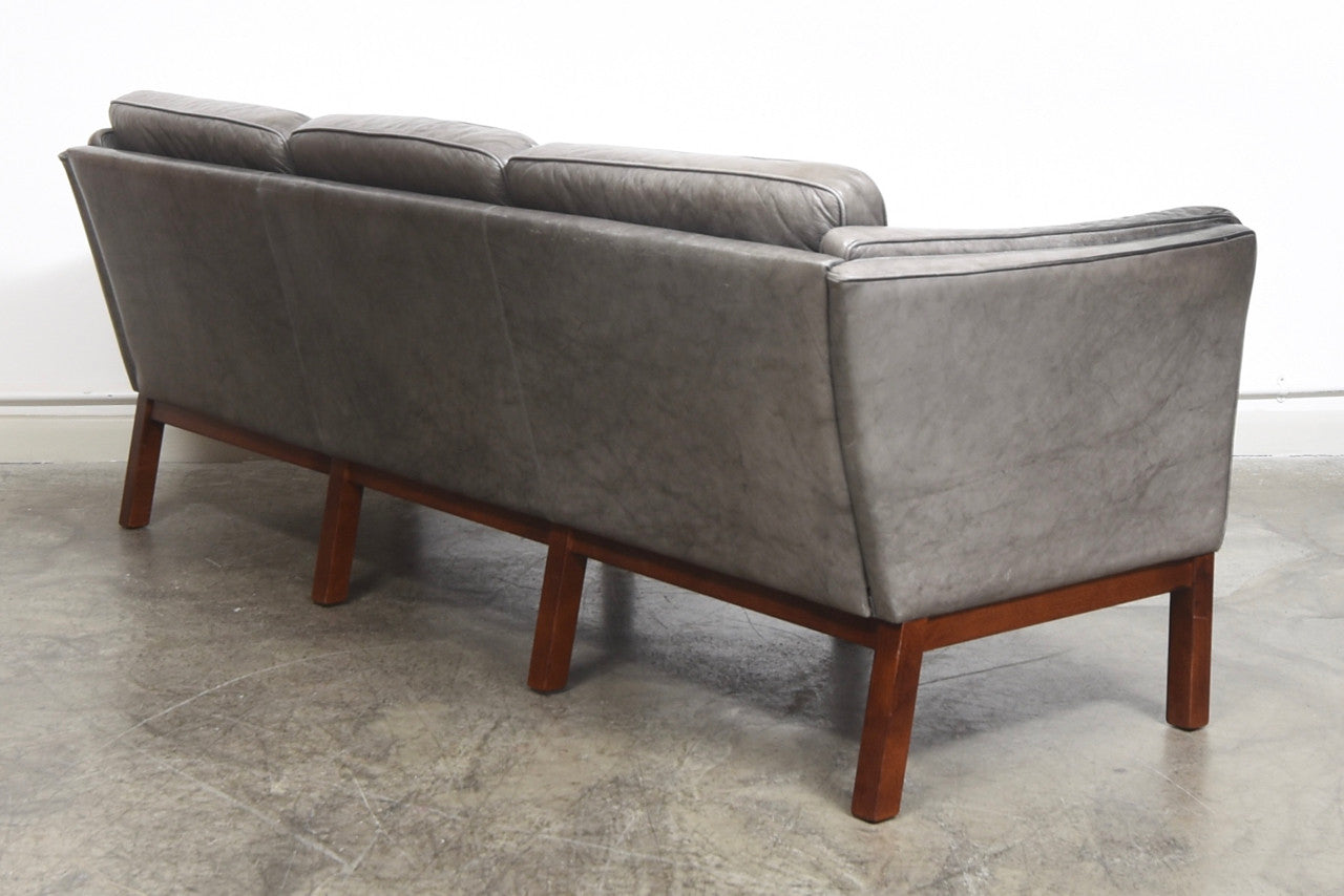 Grey leather three seater by Skipper's