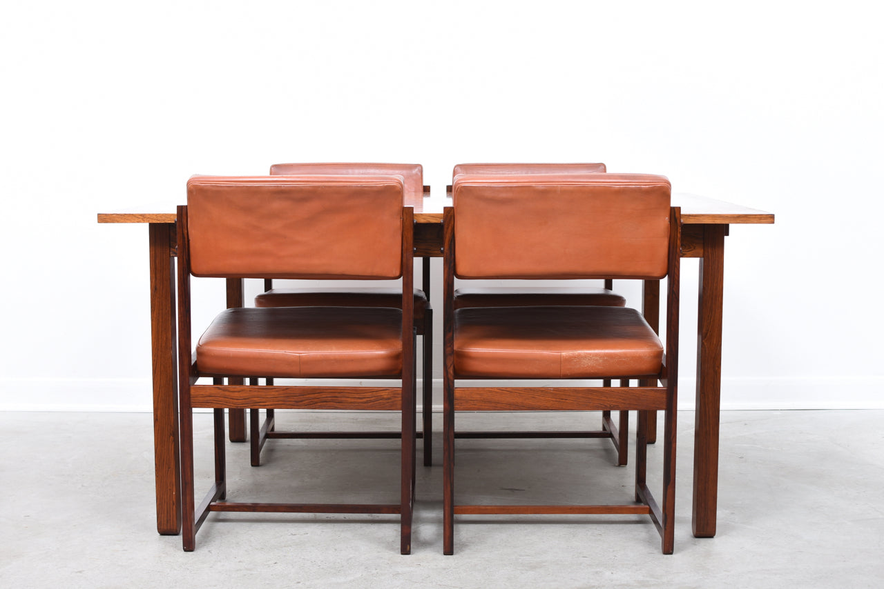 Six available: rosewood dining chairs by Erik Buch